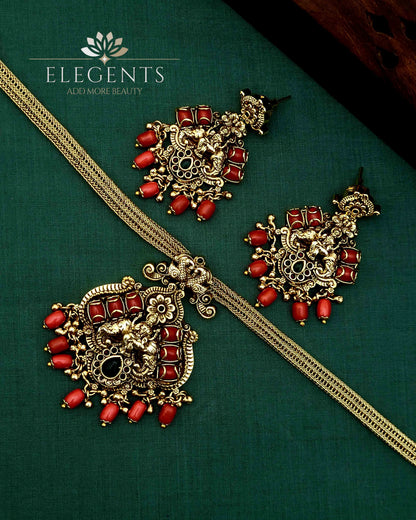 Elegents' Coral Ghungroo Beads Lakshmi With Earrings.