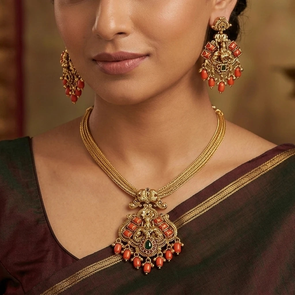 Elegents' Coral Ghungroo Beads Lakshmi With Earrings.