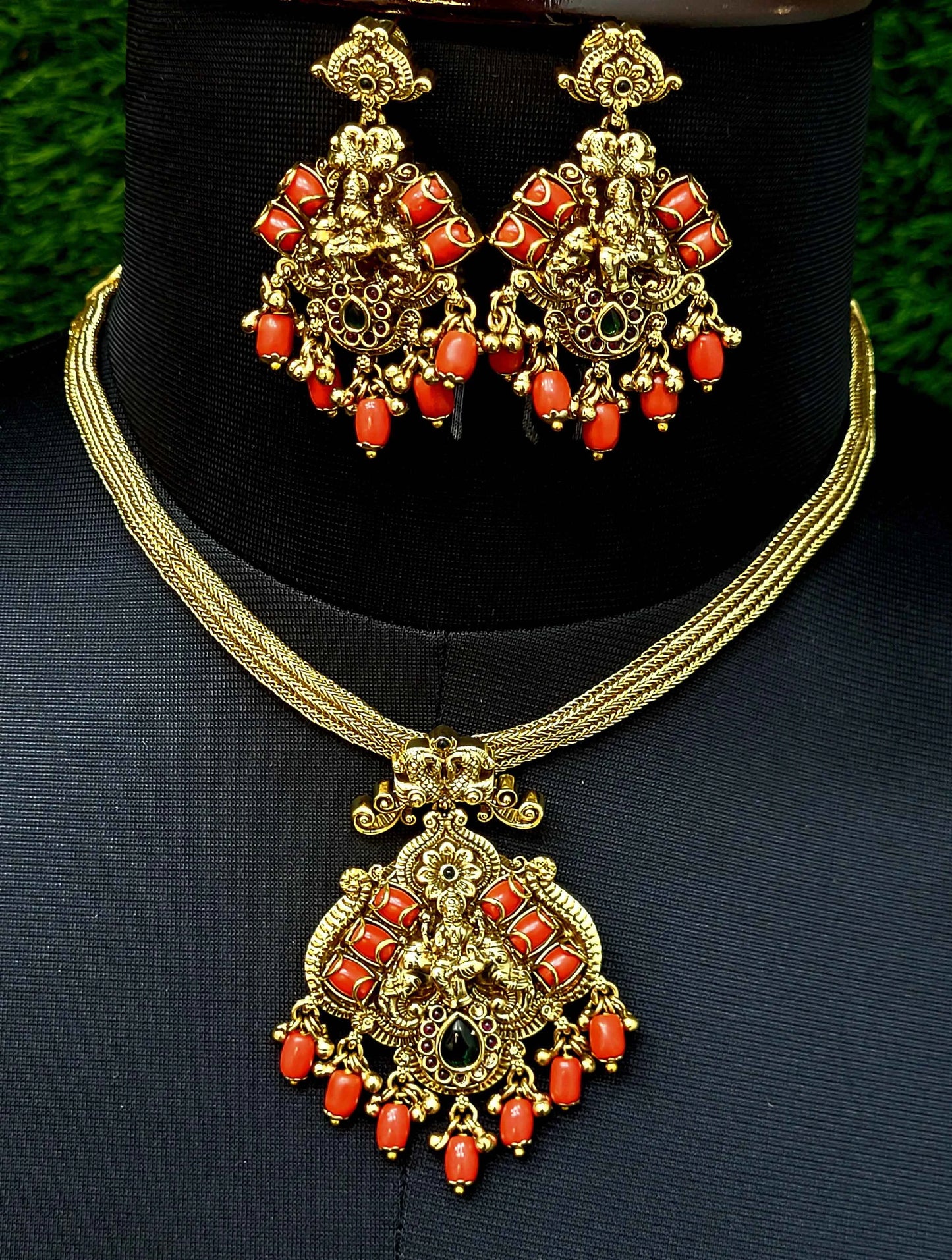 Elegents' Coral Ghungroo Beads Lakshmi With Earrings.