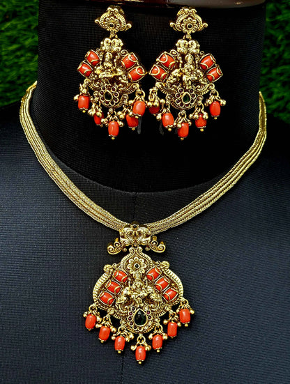 Elegents' Coral Ghungroo Beads Lakshmi With Earrings.