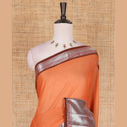 Pothys Orange plain mercerised cotton saree, contrast traditional zari border of elephant and peacock designs, striped pallu, and plain blouse