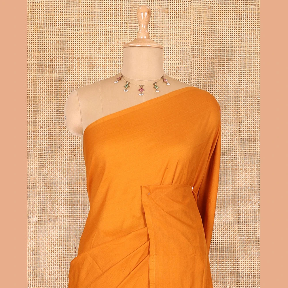 Pothys Borderless mustard pear fruit-shaped patchwork South cotton saree with a matching blouse and a contrast paisley vine printed blouse