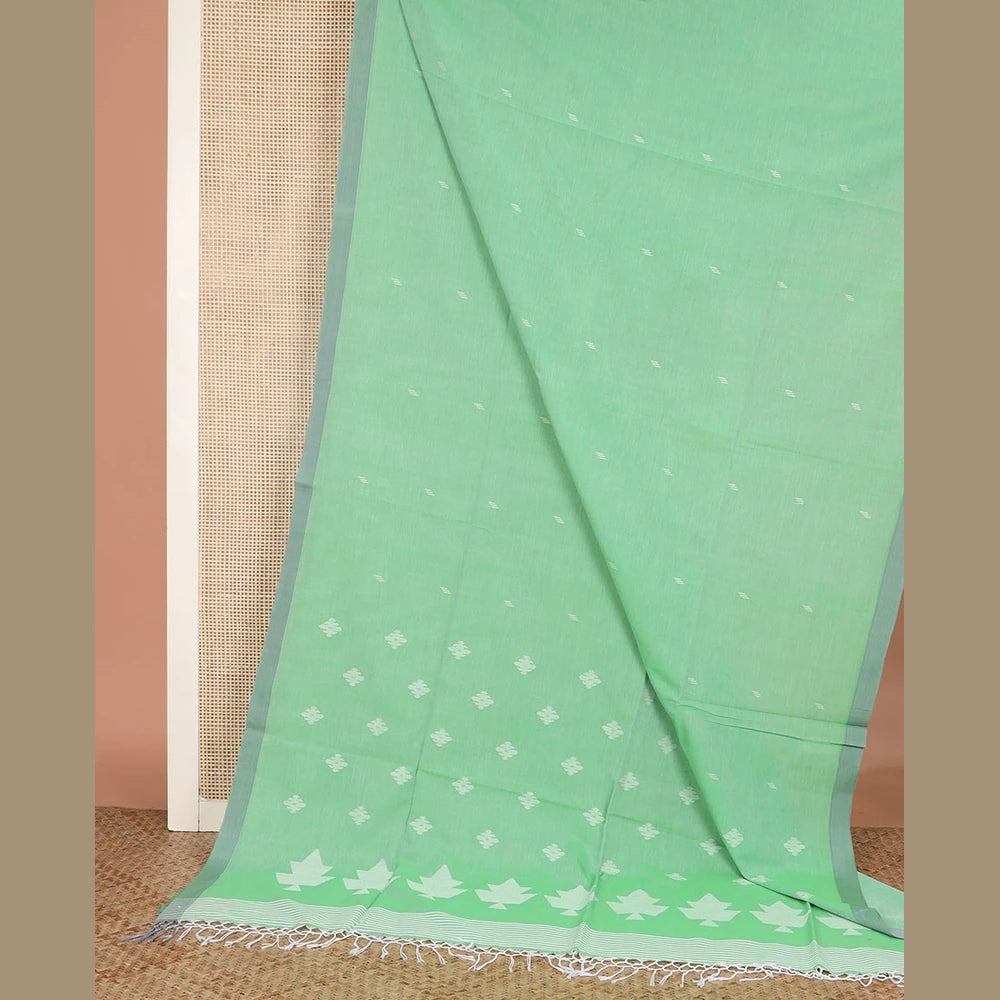 Pothys Pista green thread buttas Khadi cotton saree, contrast plain border, and pallu of geometric buttas