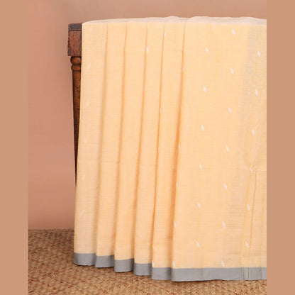 Pothys Yellow thread buttas Khadi cotton saree, contrast plain border, and pallu of geometric buttas