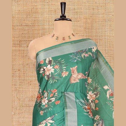 Pothys Green tropical floral and fauna motifs printed fancy tussar saree, resham border, self-pallu, and a matching blouse of print with resham thread stripes
