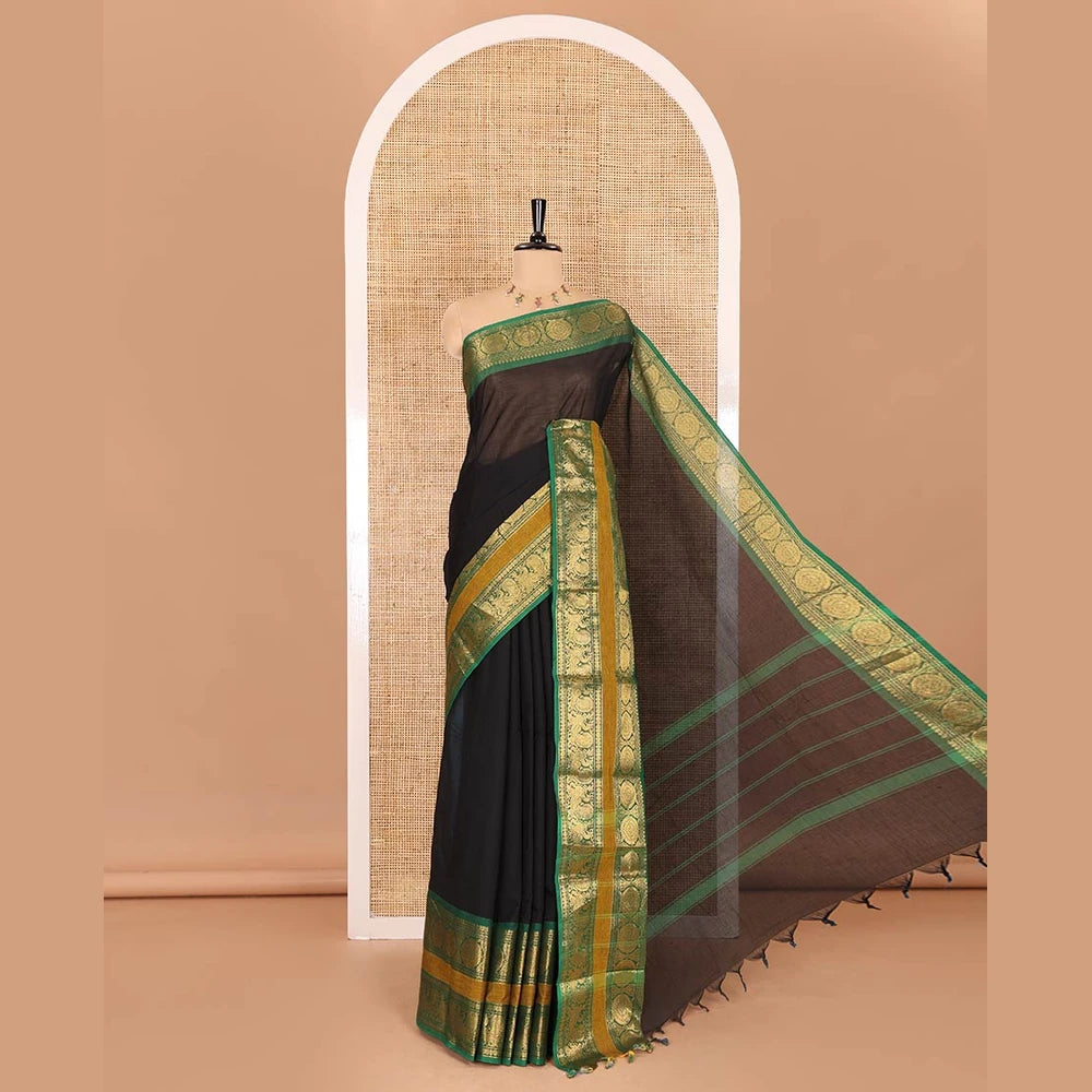 Pothys Black plain Chettinad cotton saree, contrast traditional design rettai pettu border of peacock chakram, striped pallu, and a matching blouse