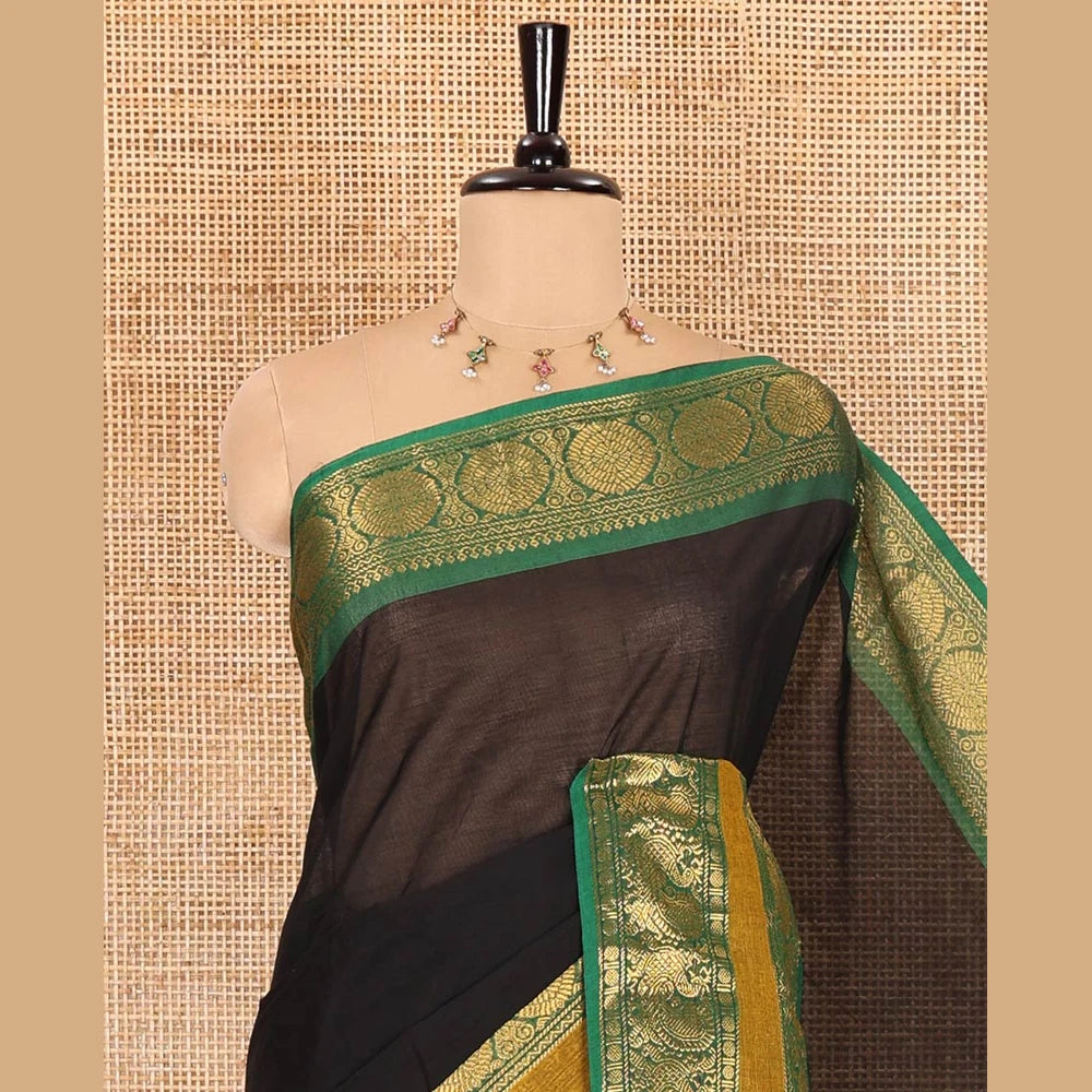 Pothys Black plain Chettinad cotton saree, contrast traditional design rettai pettu border of peacock chakram, striped pallu, and a matching blouse
