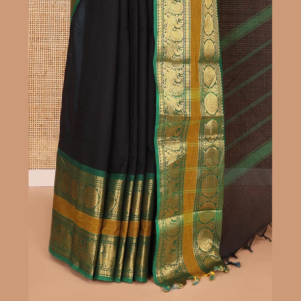 Pothys Black plain Chettinad cotton saree, contrast traditional design rettai pettu border of peacock chakram, striped pallu, and a matching blouse