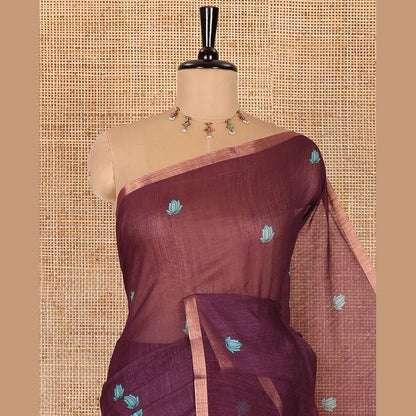 Pothys Wine lotus motifs printed linen saree, piping border, contrast floral vine printed pallu, and contrast printed blouse