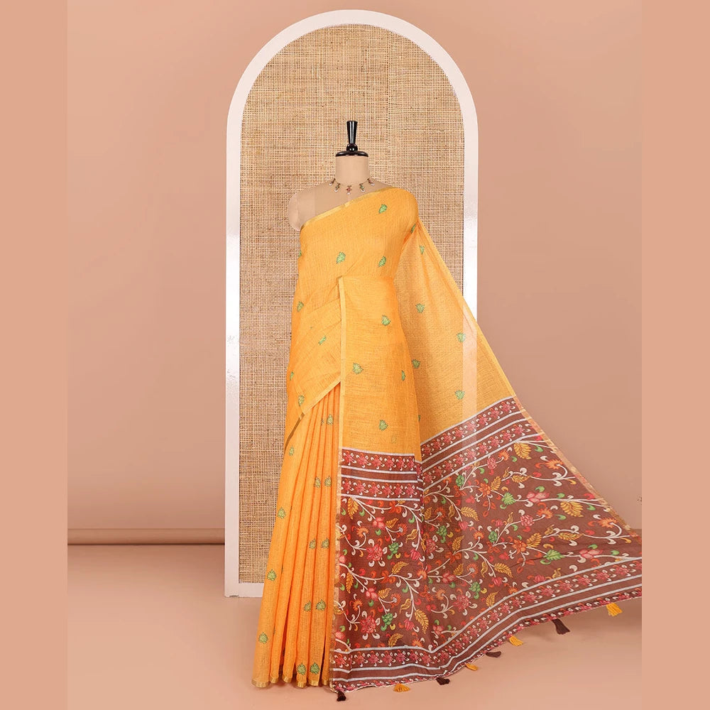 Pothys Yellow lotus motifs printed linen saree, piping border, contrast floral vine printed pallu, and contrast printed blouse