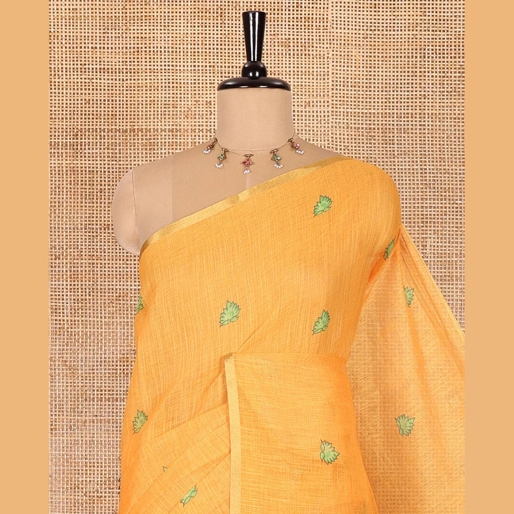 Pothys Yellow lotus motifs printed linen saree, piping border, contrast floral vine printed pallu, and contrast printed blouse