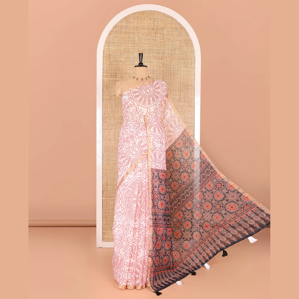 Pothys white bandhani-style floral and chakra printed saree, zari piping border, contrast ajrakh printed pallu, and contrast ajrakh printed blouse