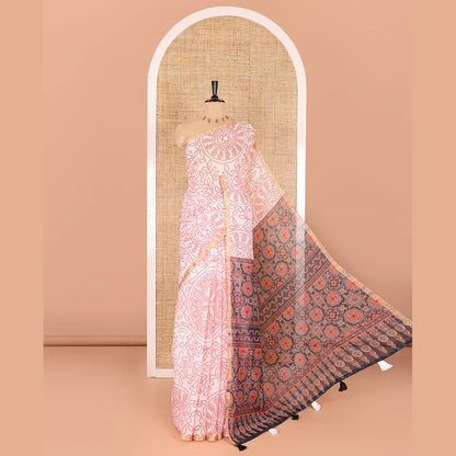 Pothys white bandhani-style floral and chakra printed saree, zari piping border, contrast ajrakh printed pallu, and contrast ajrakh printed blouse