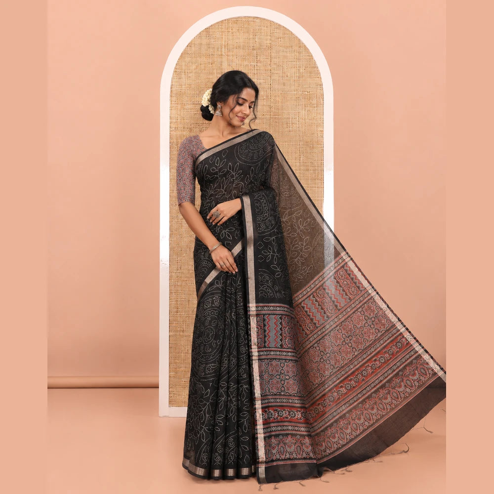 Pothys Black bandhani-style floral and chakra printed saree, zari piping border, contrast ajrakh printed pallu, and contrast ajrakh printed blouse