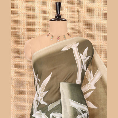 Pothys Olive green bamboo motifs printed chanderi cotton saree, contrast plain border, bamboo motifs printed pallu, and a contrast unique motifs printed blouse