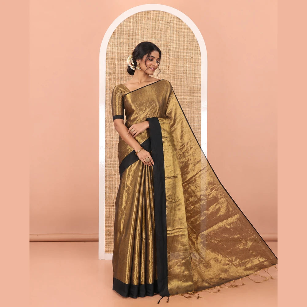Pothys Gold plain khadi tissue saree with a self-pallu, and a matching blouse