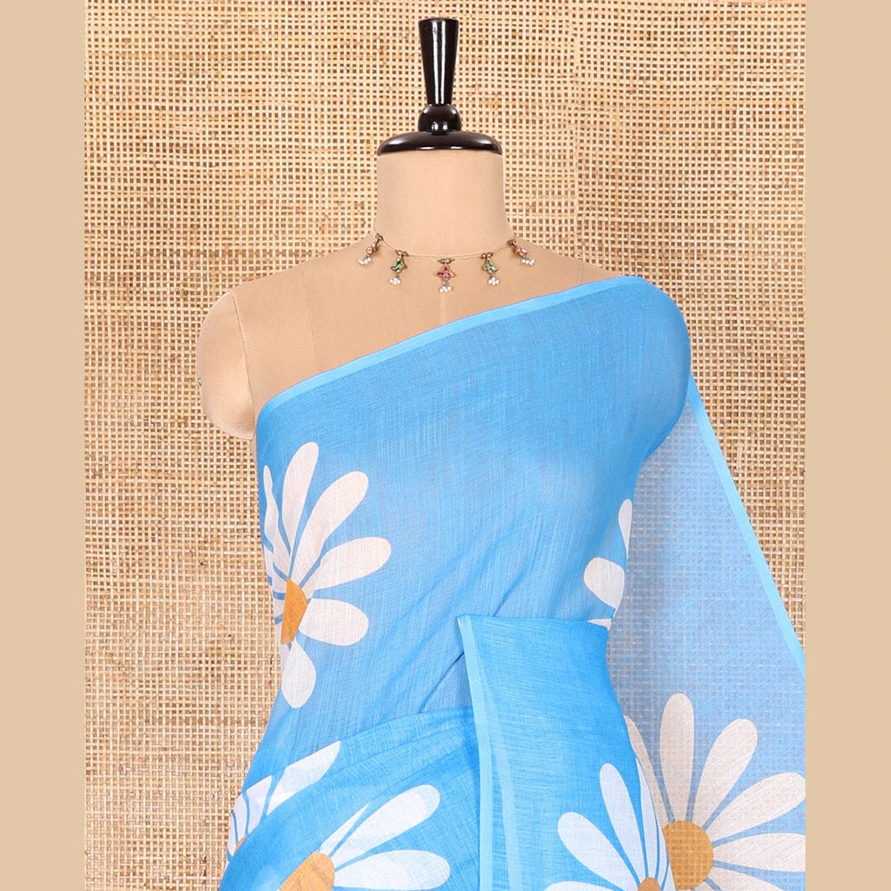 Pothys Borderless Blue Linen Saree Beautified with Big Daisy Flower Motifs Printed All Over the Body and Pallu, Complemented by a Contrast Blouse Printed with Daisy Flower Motifs