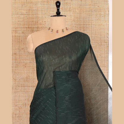 Pothys Borderless Green Khadi Mul Cotton Saree Decked with Jharna-Style Waterdrop Motifs, Featuring a Gleaming Zari-Woven Pallu, Paired with a Matching Blouse Replicating the Body Motifs
