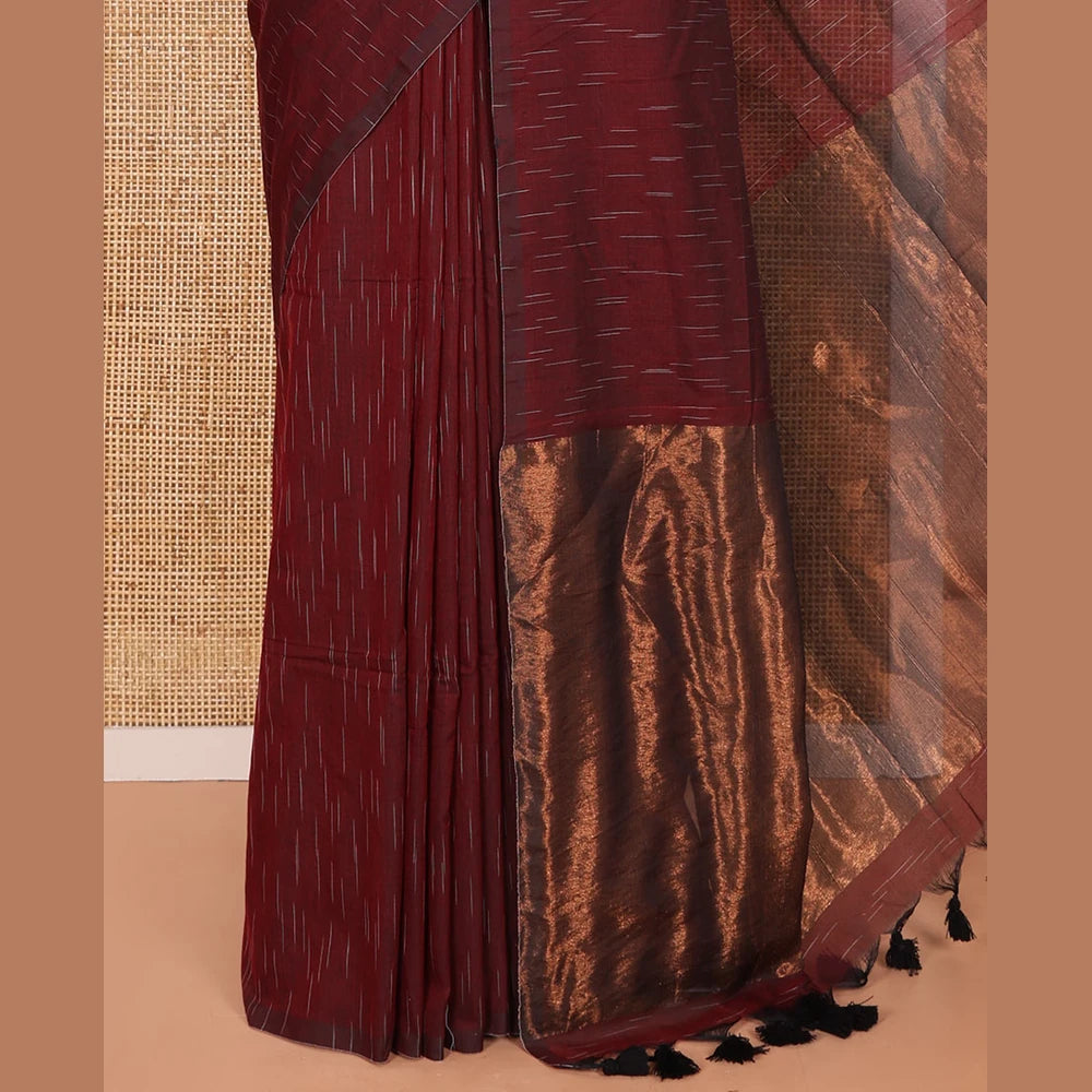 Pothys Borderless Maroon Khadi Mul Cotton Saree Decked with Jharna-Style Waterdrop Motifs, Featuring a Gleaming Zari-Woven Pallu, Paired with a Matching Blouse Replicating the Body Motifs