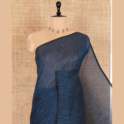 Pothys Borderless Blue Khadi Mul Cotton Saree Decked with Jharna-Style Waterdrop Motifs, Featuring a Gleaming Zari-Woven Pallu, Paired with a Matching Blouse Replicating the Body Motifs