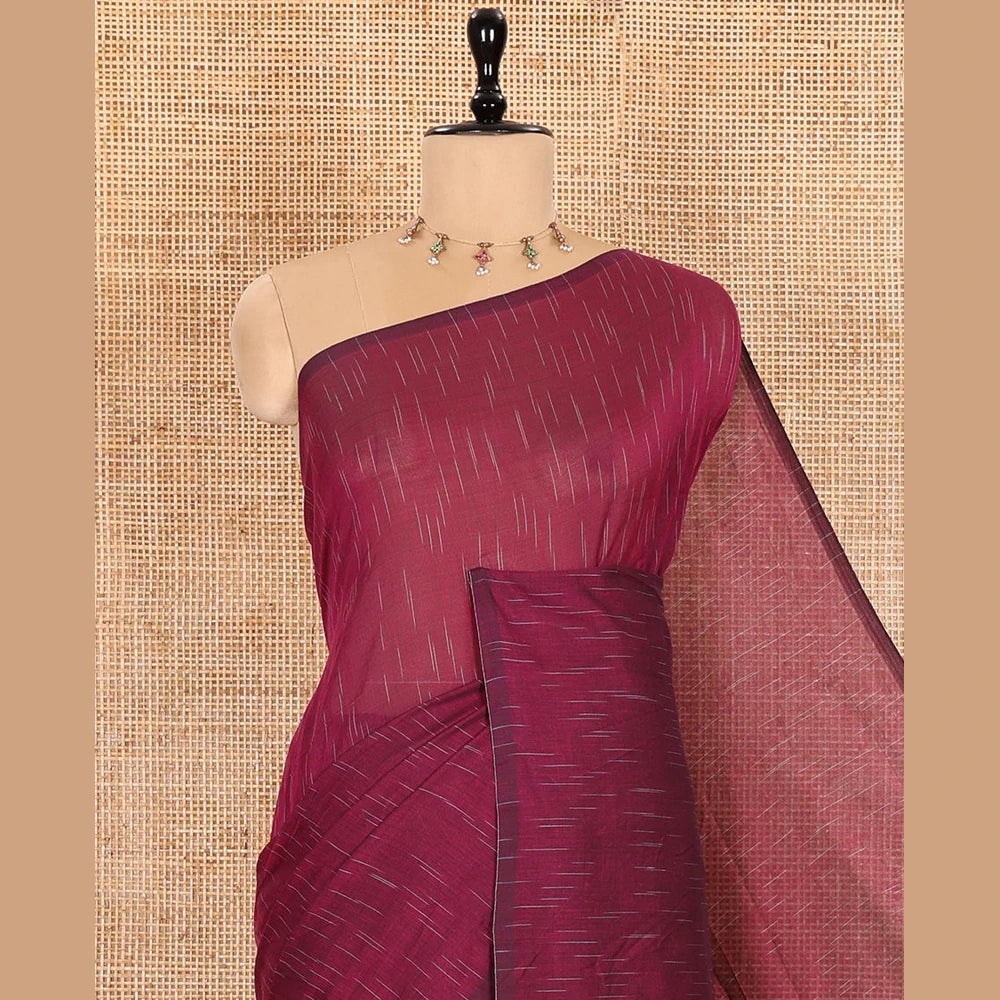 Pothys Borderless Purple Khadi Mul Cotton Saree Decked with Jharna-Style Waterdrop Motifs, Featuring a Gleaming Zari-Woven Pallu, Paired with a Matching Blouse Replicating the Body Motifs