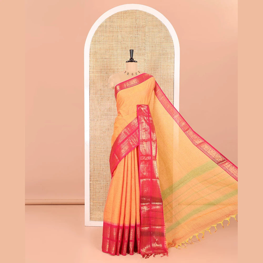 Pothys Orange Plain Chettinad Cotton Saree Highlighted with a Contrasting Temple Rettai Pettu Border of Peacock-Elephant Motifs, a Subtle Pallu of Stripes, and a Matching Blouse