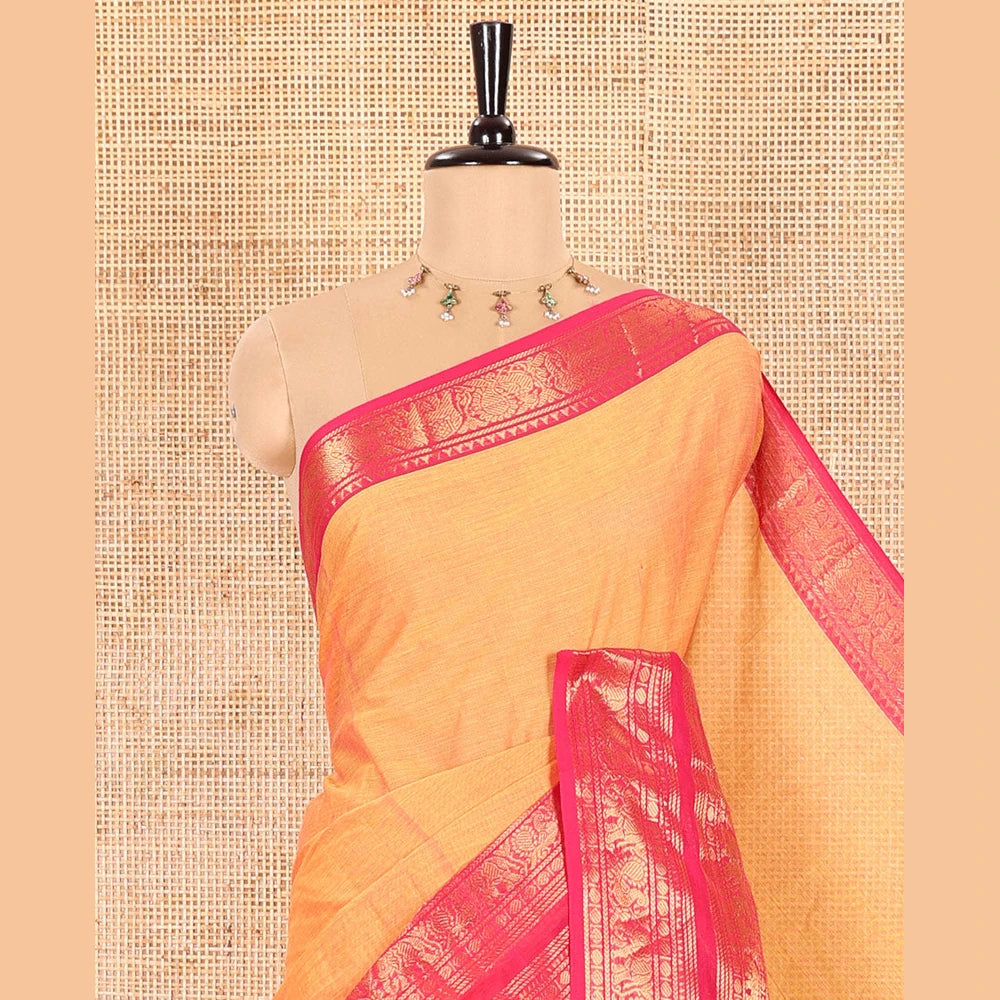 Pothys Orange Plain Chettinad Cotton Saree Highlighted with a Contrasting Temple Rettai Pettu Border of Peacock-Elephant Motifs, a Subtle Pallu of Stripes, and a Matching Blouse