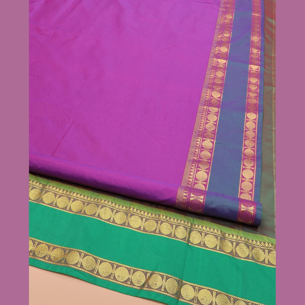 Pothys Purple Plain Ten-Yard Art Silk Saree Complemented by a Contrast Rettai Pettu Rudraksham Motifs Border, and Pallu Steeped with Rudraksham Motifs in Zari