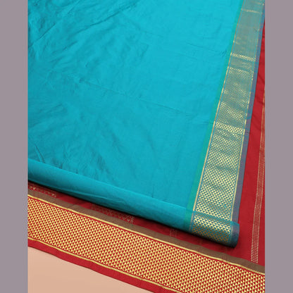 Pothys Blue Plain Ten-Yard Art Silk Saree, Complemented by a Contrast Traditional Ara Maadam Border, and Pallu Steeped with Zari Designs,