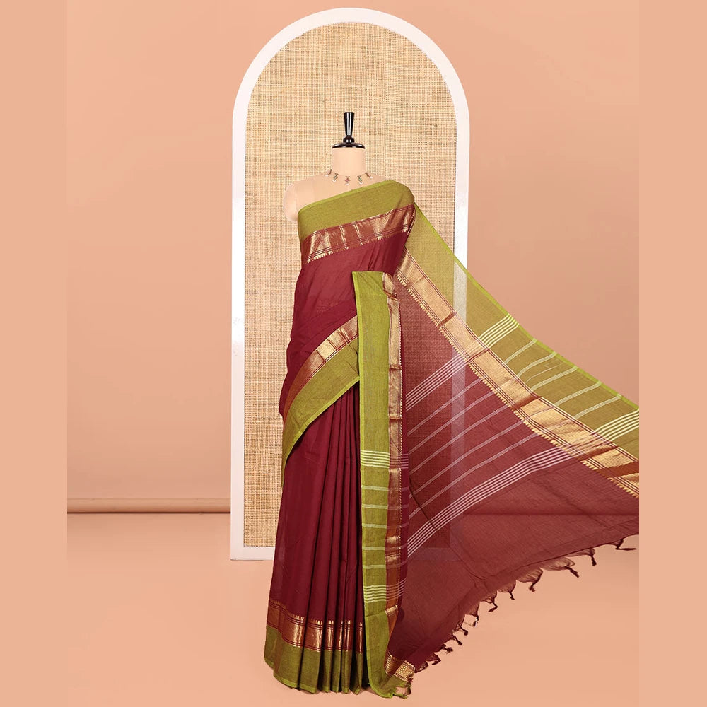 Pothys Maroon Plain Chettinad Cotton Saree, Complemented by Contrast Traditional Zari Temple Border, Subtly Striped Pallu, and Paired with a Matching Blouse