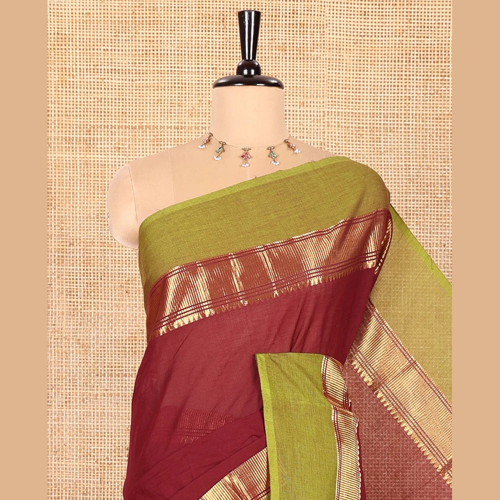Pothys Maroon Plain Chettinad Cotton Saree, Complemented by Contrast Traditional Zari Temple Border, Subtly Striped Pallu, and Paired with a Matching Blouse