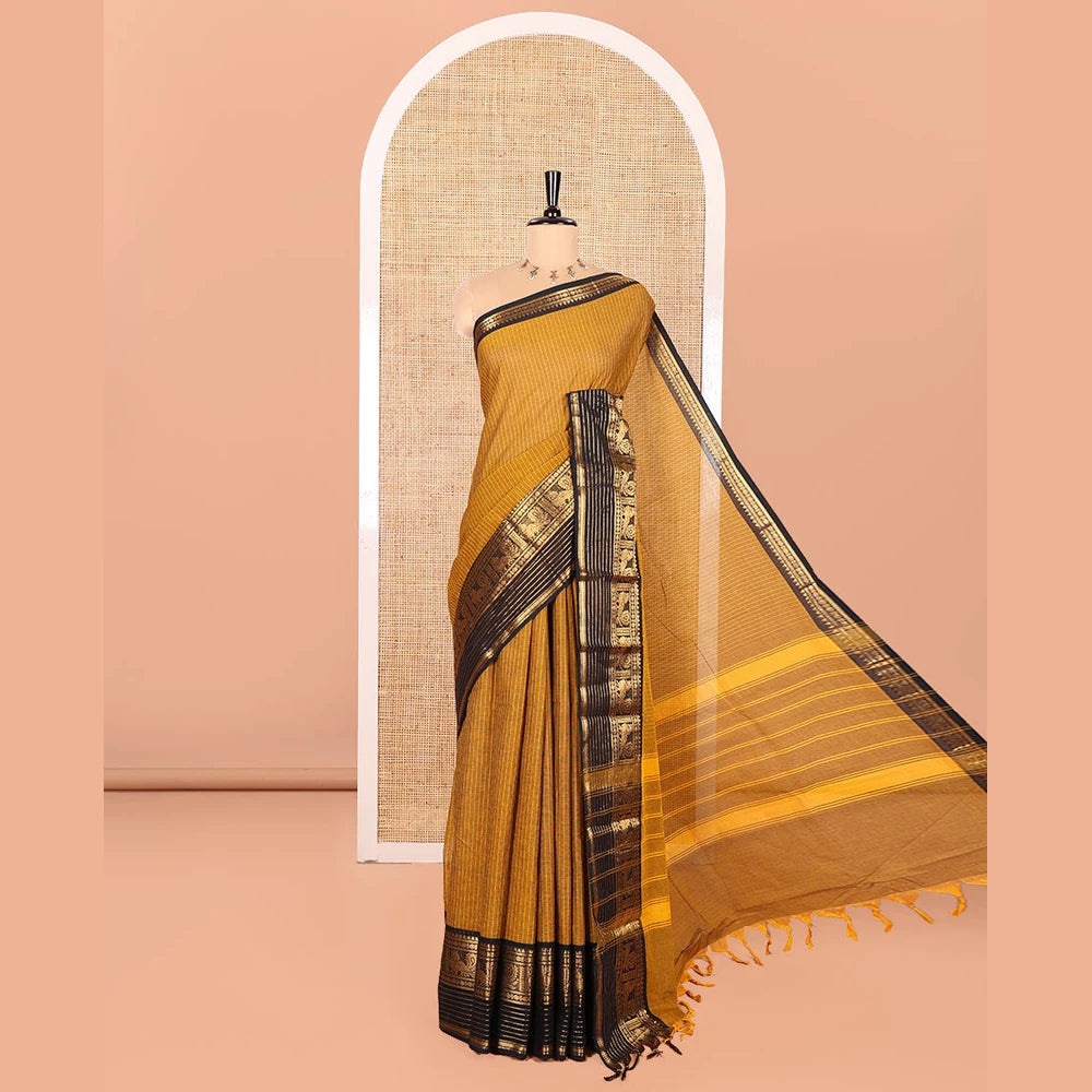 Pothys Gold Chettinad Cotton Saree Subtly Sparkled with Stripes All Over Its Body, Complemented by Contrast Traditional Zari Border of Peacock Designs, Subtly Striped Pallu, and Paired with a Matching Blouse
