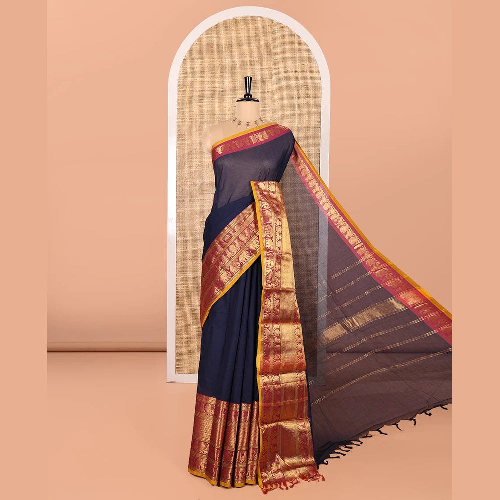 Pothys Navy Blue Blue Plain Chettinad Cotton Saree, Complemented by Contrast Traditional Zari Border of Peacock and Elephant Designs, Gleaming Pallu of Stripes, and Paired with a Matching Blouse