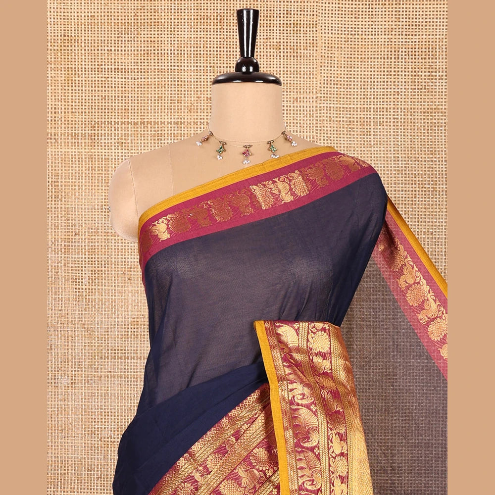 Pothys Navy Blue Blue Plain Chettinad Cotton Saree, Complemented by Contrast Traditional Zari Border of Peacock and Elephant Designs, Gleaming Pallu of Stripes, and Paired with a Matching Blouse