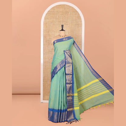 Pothys Blue-Green Double-Shade Plain Chettinad Cotton Saree, Complemented by Contrast Border Steeped with Traditional Zari Designs, Subtly Striped Pallu, and Paired with a Matching Blouse