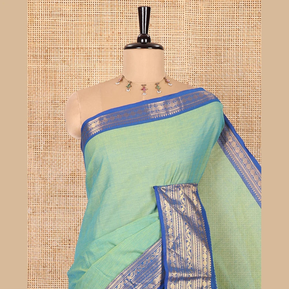 Pothys Blue-Green Double-Shade Plain Chettinad Cotton Saree, Complemented by Contrast Border Steeped with Traditional Zari Designs, Subtly Striped Pallu, and Paired with a Matching Blouse