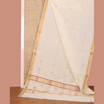 Pothys Cream Kerala Saree, Dazzled with Zari Buttas on Its Body, Bavanji Zari Border, Sparkling Pallu of Zari Designs, and Paired with a Matching Blouse