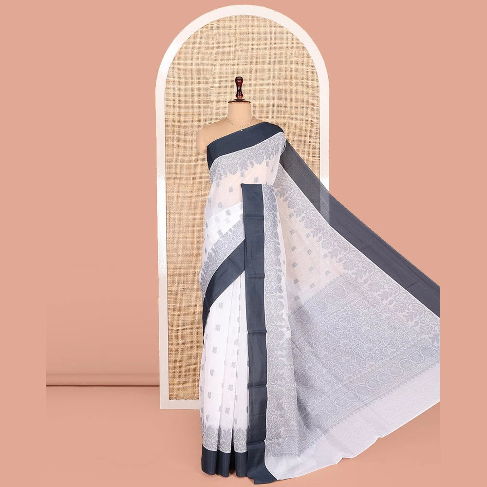 Pothys White Semi-Silk Cotton Saree, Sparsely Woven with Buttas and Floral Designs All Over Its Body, Complemented by Contrast Border, Sparsely Woven Pallu of Floral Jaal Designs, and Paired with a Matching Blouse