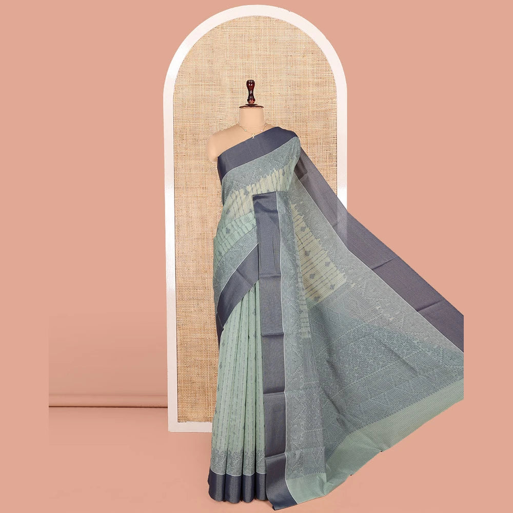Pothys Pastel Blue Semi-Silk Cotton Saree, Sparsely Woven with Buttas and Geometric Designs All Over Its Body, Complemented by Contrast Border, Sparsely Woven Pallu of Geometric Designs, and Paired with a Matching Blouse