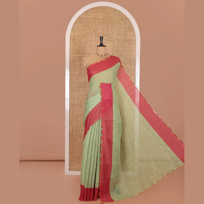 Pothys Green Plain Linen Cotton Saree, Complemented by Contrast Scallop Border, Plain Pallu, and Paired with a Contrast Floral Printed Mirror Embroidered Blouse