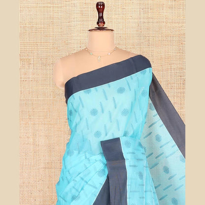 Pothys Blue Semi-Silk Cotton Saree, Subtly Adorned with Buttas on Its Body, Complemented by Contrast Border, Sparsely Designed Pallu of Geometric Designs, and Paired with a Matching Blouse