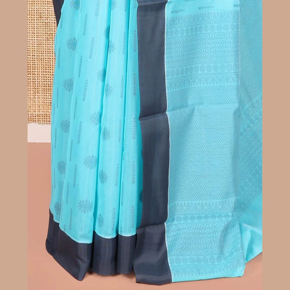 Pothys Blue Semi-Silk Cotton Saree, Subtly Adorned with Buttas on Its Body, Complemented by Contrast Border, Sparsely Designed Pallu of Geometric Designs, and Paired with a Matching Blouse