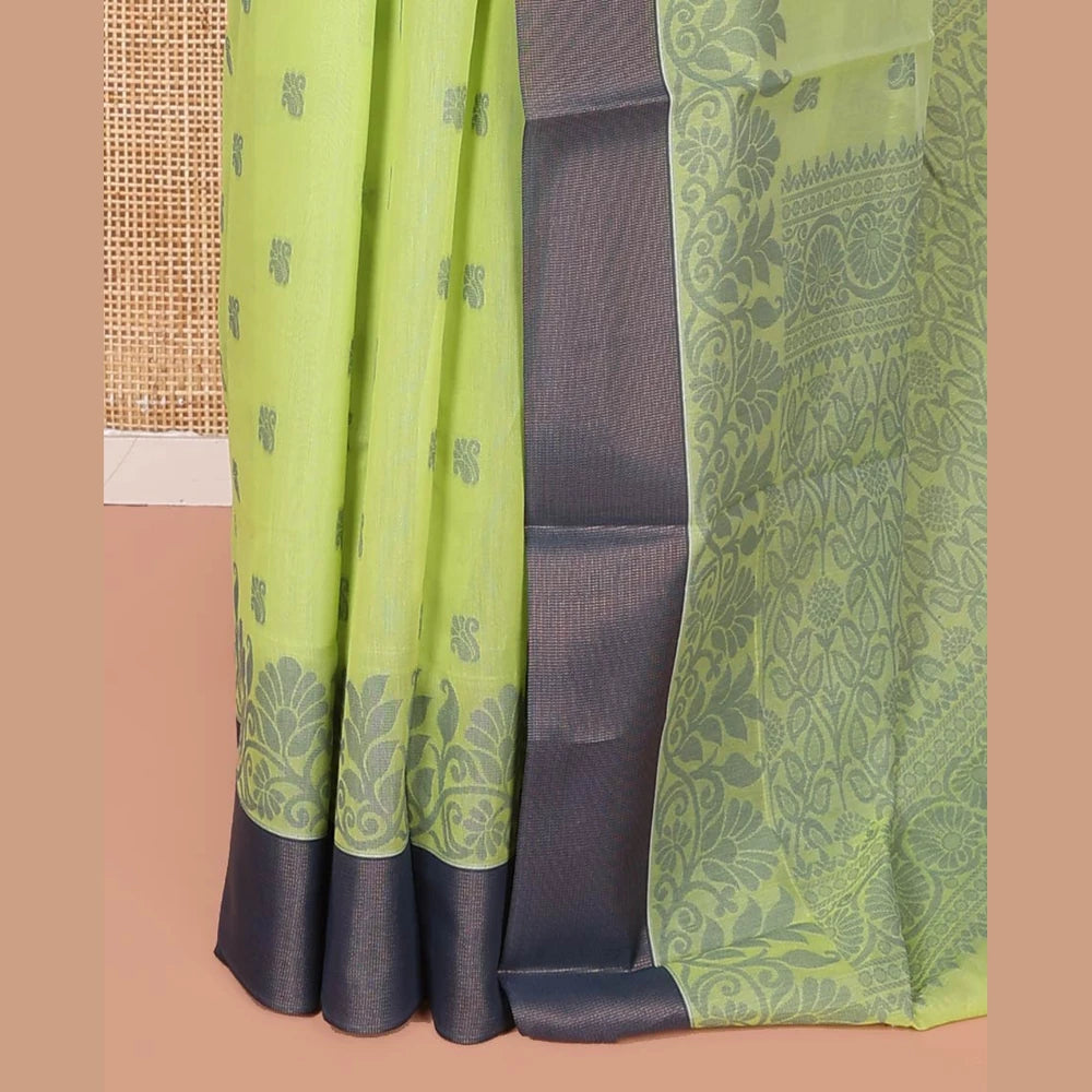 Pothys Green Semi-Silk Cotton Saree, Sparsely Woven with Floral Buttas on Its Body, Complemented by Contrast Border, Pallu Steeped with Floral Designs, and Paired with a Matching Blouse