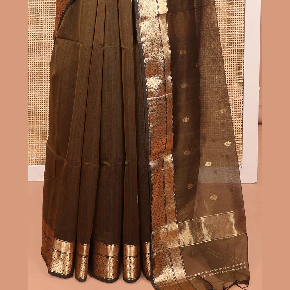 Pothys Green Maheshwari Cotton Saree, Decorated with Buttas All Over Its Body, Highlighted by a Zari Traditional Design Border, Pallu Steeped with Buttas, and Paired with a Matching Blouse