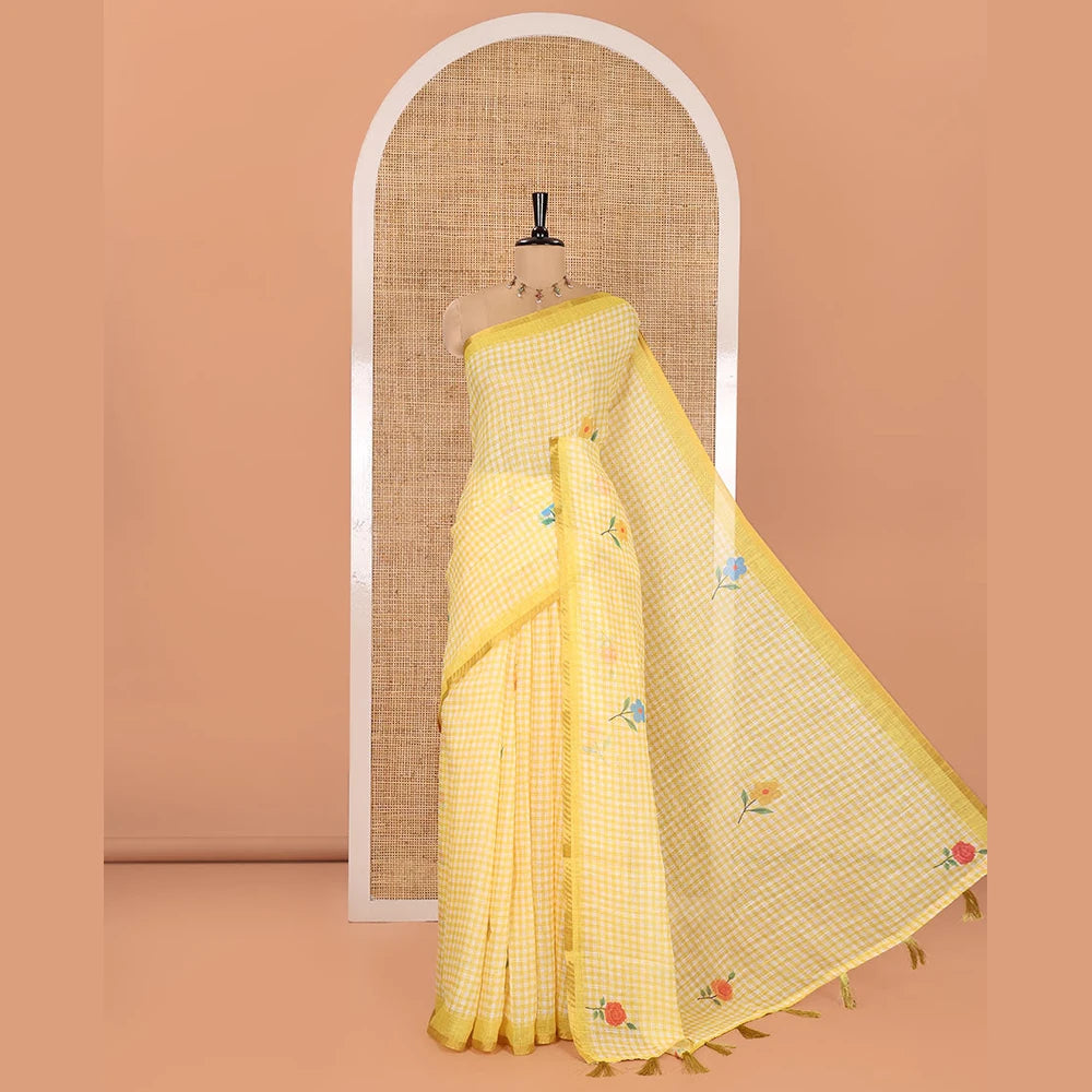 Pothys Yellow Linen Cotton Saree, Beautiful Decked Up with Checks and Floral Motifs Printed All Over Its Body, Subtle Piping Border, Pallu Mirrors the Same Design, and Paired with a Printed Blouse