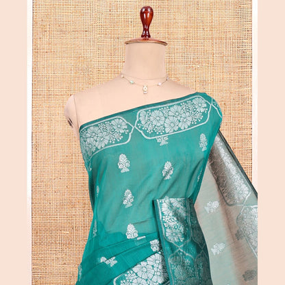 Pothys Green Semi-Silk Cotton Saree, Elevated with Zari Buttas All Over Its Body, a Subtle Border of Floral Designs, Grand Jaal Pallu, and Paired with a Matching Blouse
