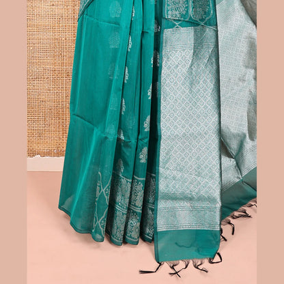 Pothys Green Semi-Silk Cotton Saree, Elevated with Zari Buttas All Over Its Body, a Subtle Border of Floral Designs, Grand Jaal Pallu, and Paired with a Matching Blouse