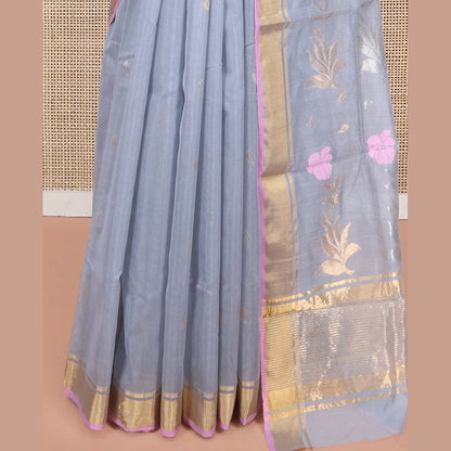 Pothys Grey Chanderi Cotton Saree, Decorated with Zari Buttas All Over Its Body, Highlighted by a Zari Border, Pallu of Zari Stripes and Floral Buttas, and Paired with a Matching Blouse