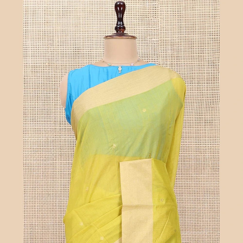 Pothys Yellow Chanderi Cotton Saree, Subtly Sparkled with Buttas All Over Its Body, Subtly Woven Bavanji Border, Complemented by a Contrast Pallu of Floral Designs, and Paired with a Contrast Blouse