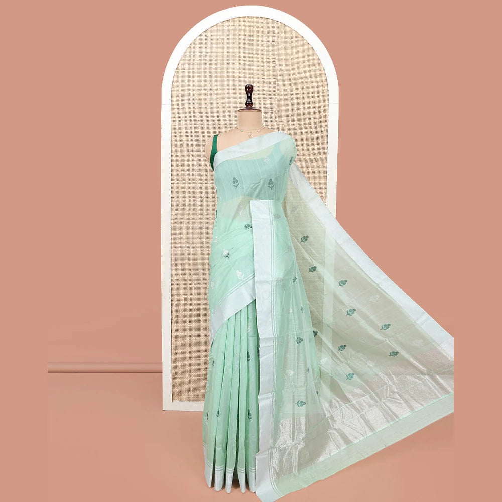Pothys Green Chanderi Cotton Saree, Subtly Decked up with Floral Buttas All Over Its Body, Highlighted by a Bavanji Border, Pallu Steeped with Zari Stripes, and Paired with a Matching Blouse